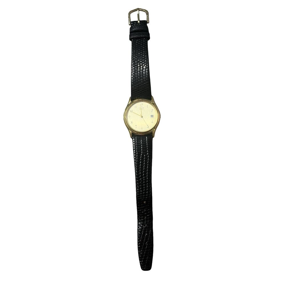 Citzen Quarts Gold Face Watch With Black Band 8110
